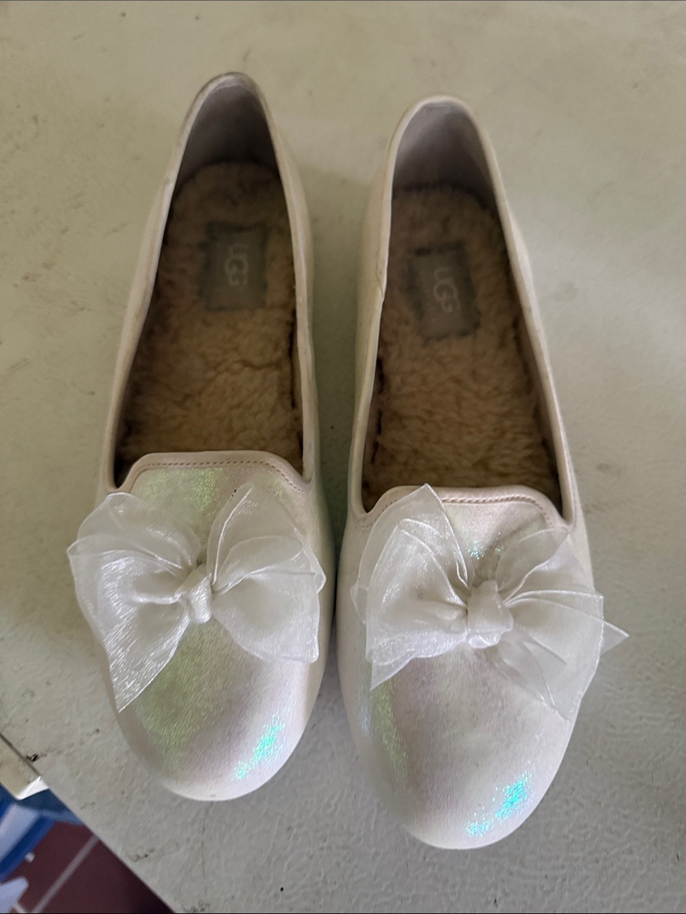 UGG Women's Iridescent Cream Bow Slip-On Flats
